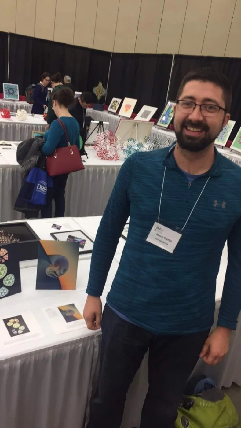 At the Mathematical Art Exhibition, JMM 2019.