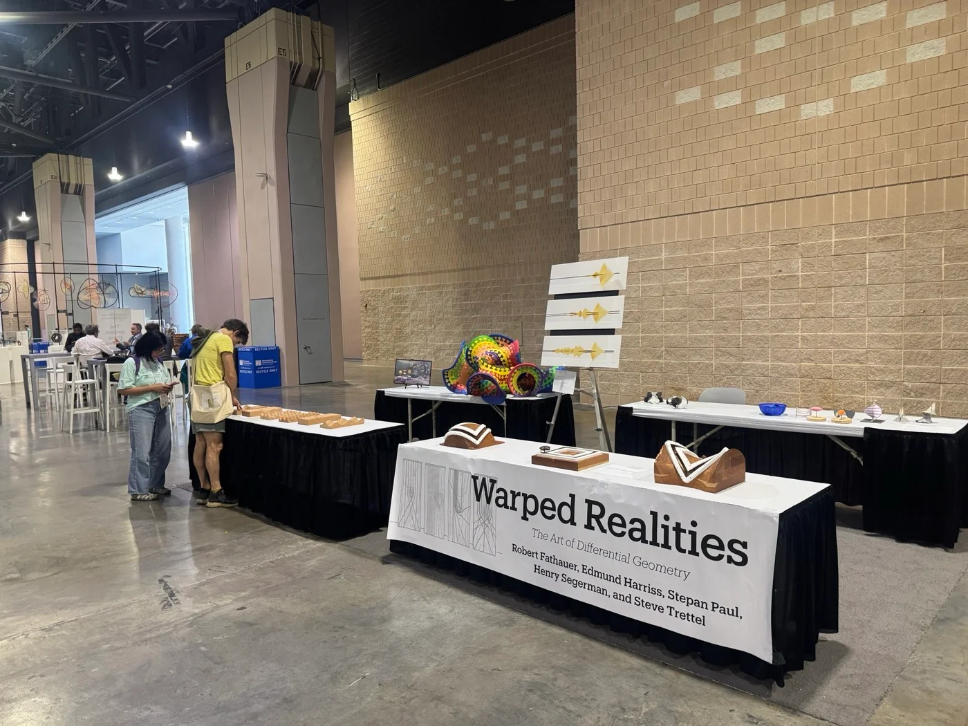 The Warped Realities table, shown with Robert Fathauer, Edmund Harriss, Stepan Paul and Henry Segerman.